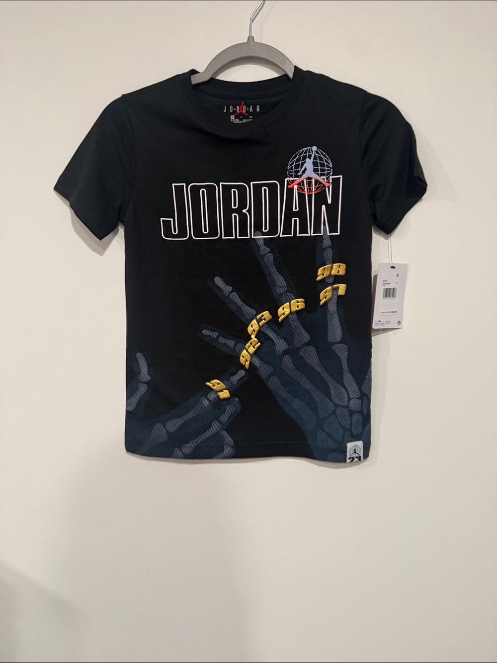 Jordan Black Graphic Skeleton Logo Tee with Gold Accents